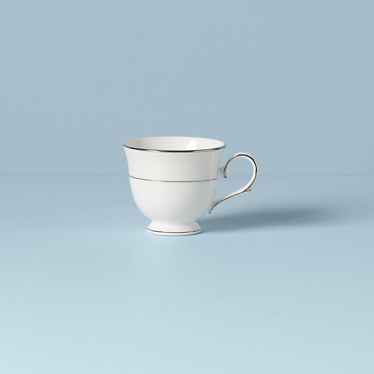 Elegant Bone China Teacup with Platinum Accents | Opal Innocence