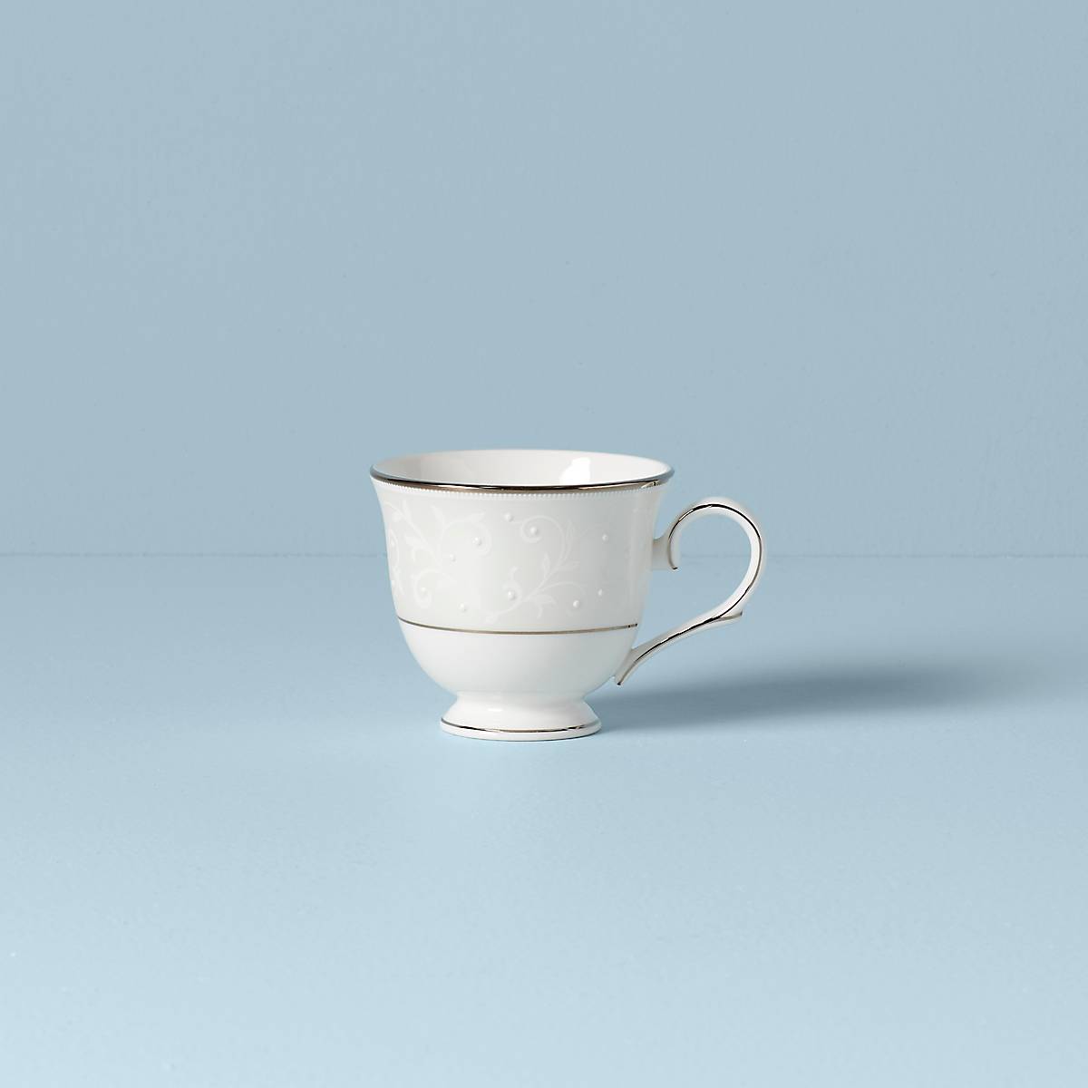 Elegant Bone China Teacup with Platinum Accents | Opal Innocence