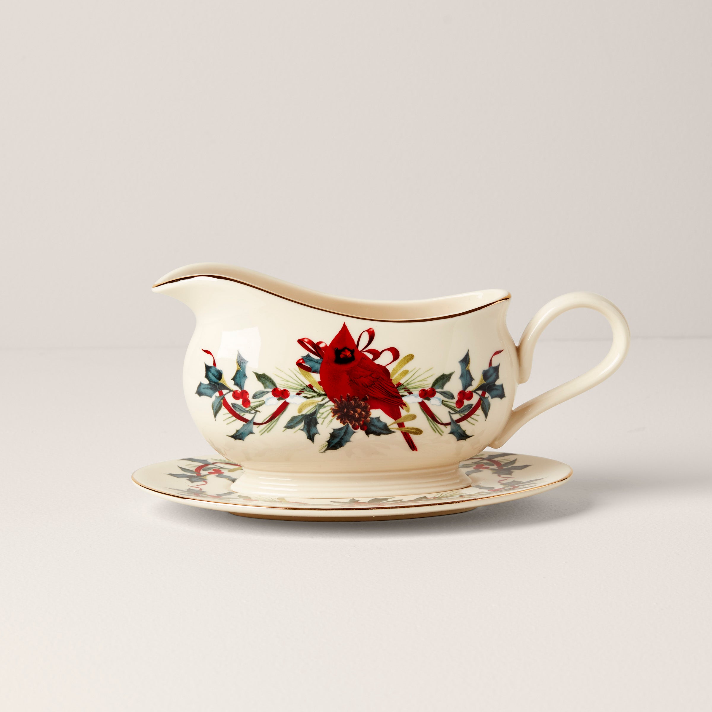 Elegant Ceramic Gravy Boat with Gold Accents & Cardinal Design
