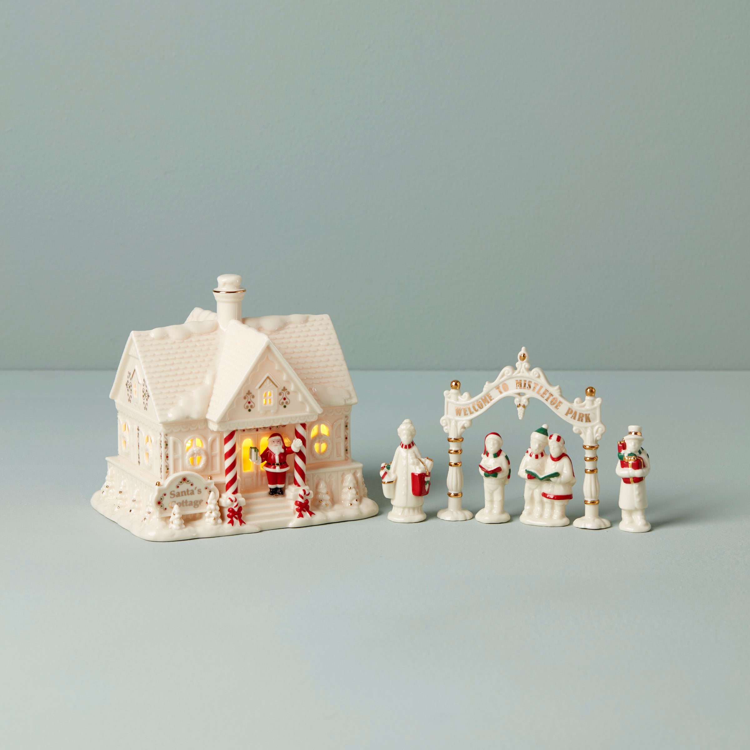 Porcelain Christmas Village Set with Light-Up Cottage & Carolers | Mistletoe Park