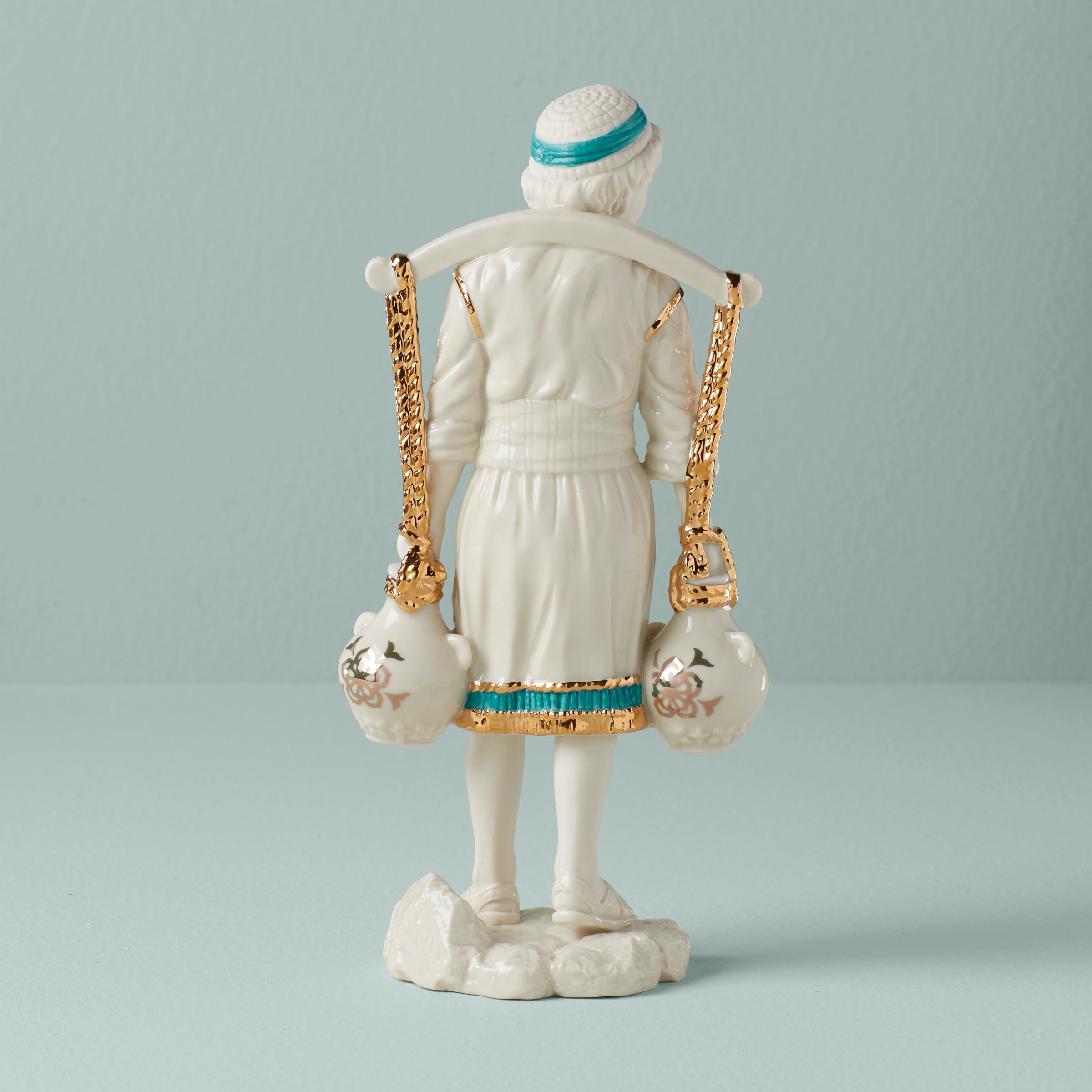 Ceramic Water Boy Figurine with Teal & Gold Accents | First Blessing