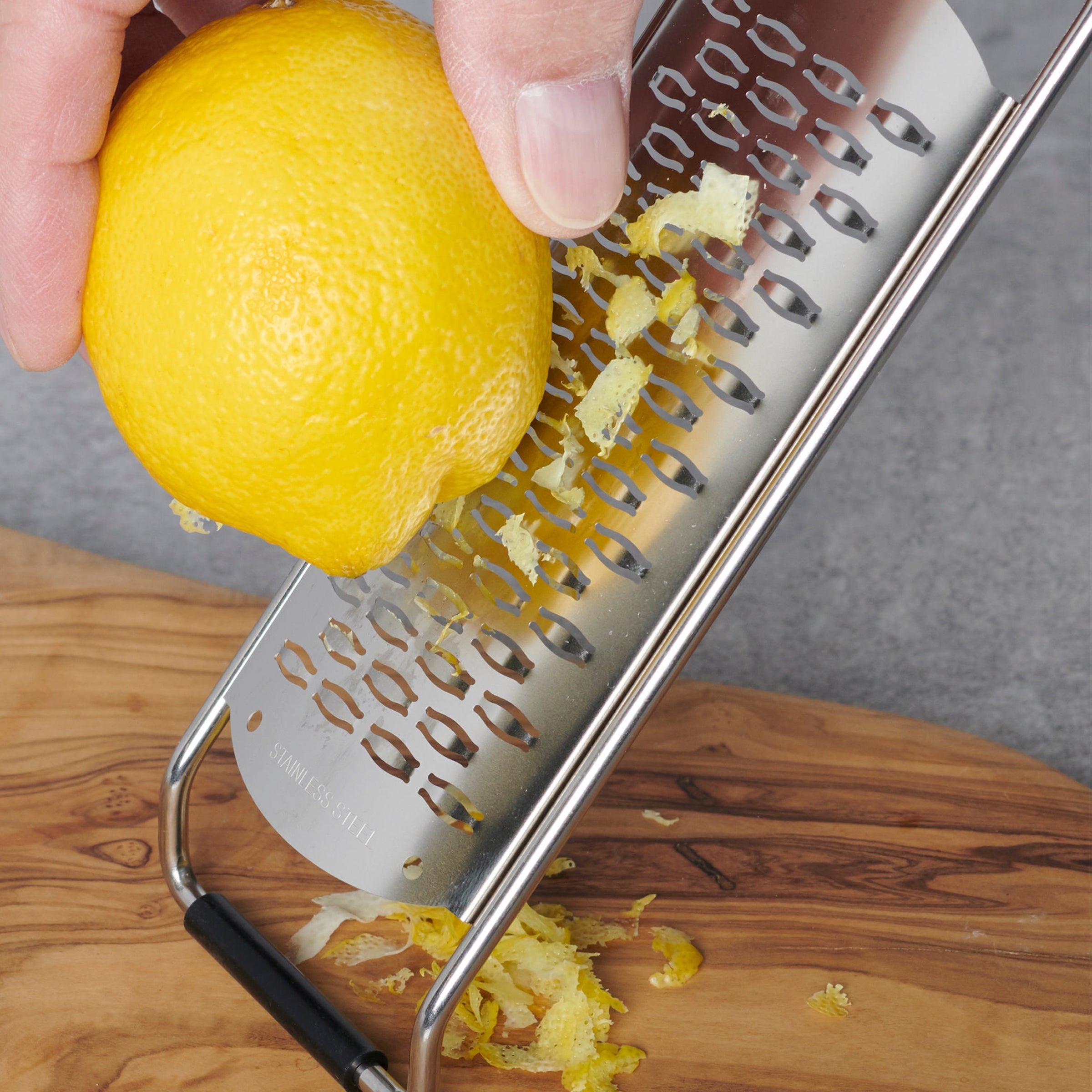 Stainless Steel Grater with Ergonomic Handle & Non-Slip Base | Oneida